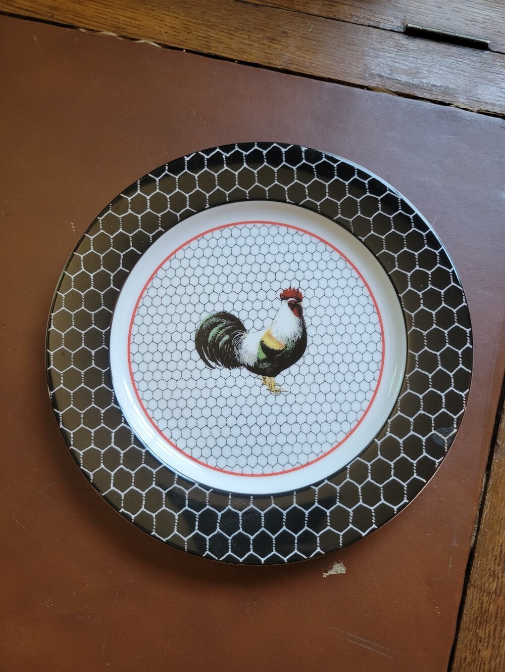 Department 56 salad plate featuring a black rooster